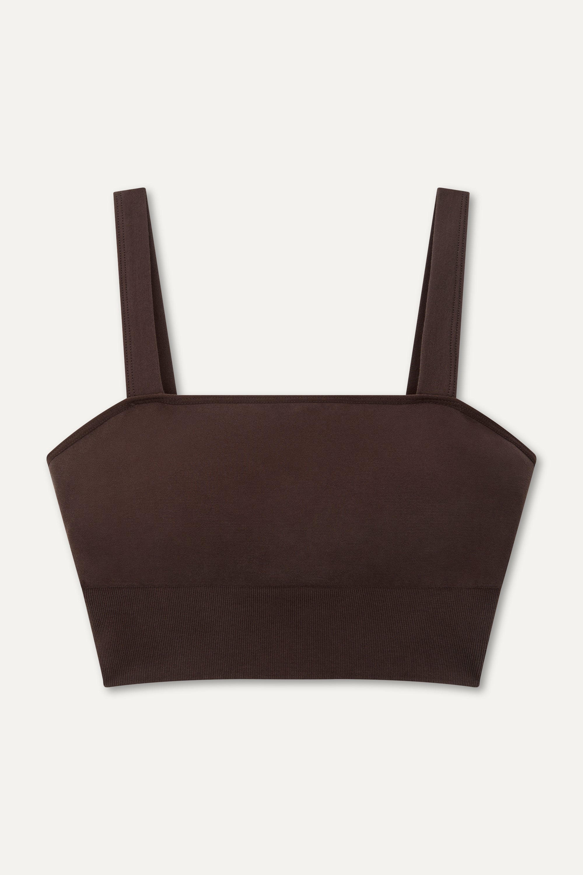 Brown luxury bamboo bandeau brown sports bra featuring a square neckline and removable pads, crafted from soft brown fabric with a blend of bamboo viscose, polyamide, and elastane for a smooth, comfortable fit. Perfect for yoga, Pilates, lounging, and low-impact workouts, this elegant sports bra pairs beautifully with matching Ananda Bamboo Trousers for a chic athleisure look