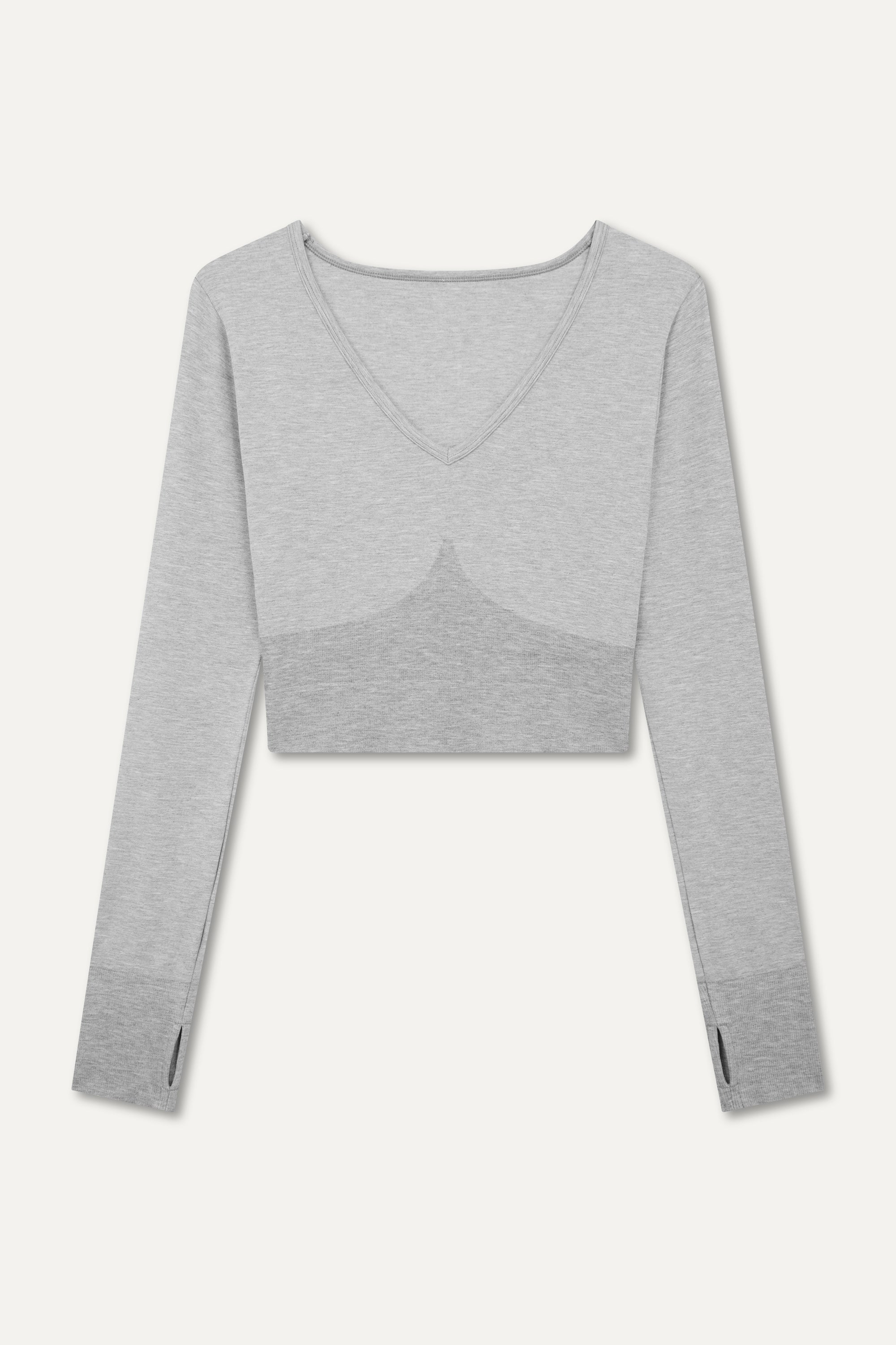 Grey stylish cropped long-sleeve athleisure top made from eco-friendly bamboo fabric, featuring a flattering V-neckline, thumbholes for added comfort, and contouring panels for a sculpted fit. Perfect for activewear, this moisture-wicking and breathable top is ideal for workouts, yoga, and casual everyday outfits.